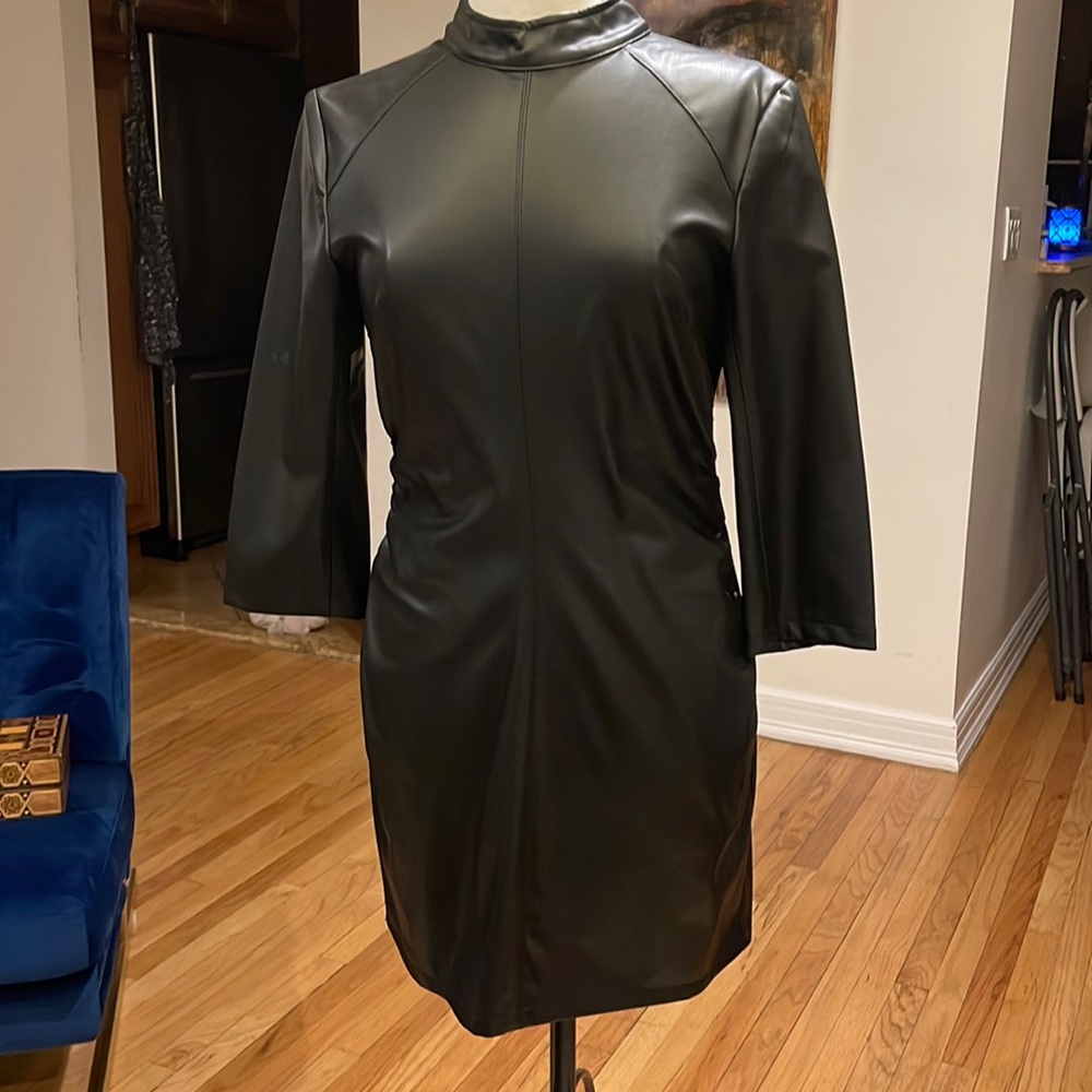 Zara faux leather mini dress with open back size L ( run a little small)